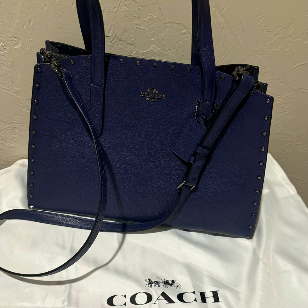 Cadet Navy Coach Charlie Carry All with Crystal Rivets.  Like new condition.